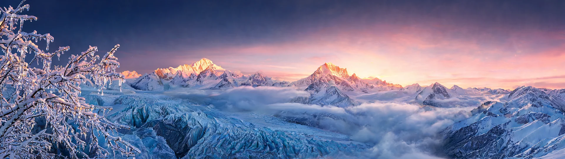 Alpine Glow Over Sunlit Peaks