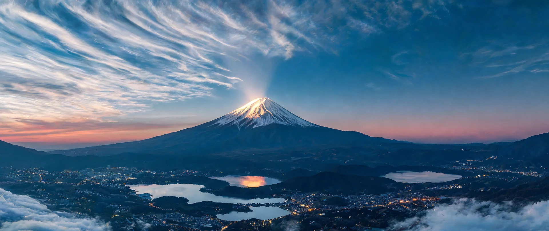 Lone Fuji Gleaming Through Cloud