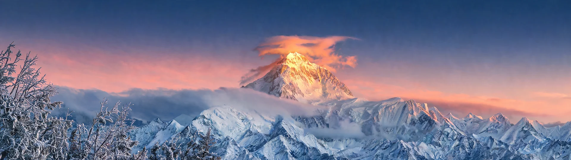 Alpenglow Over Frosted Peaks