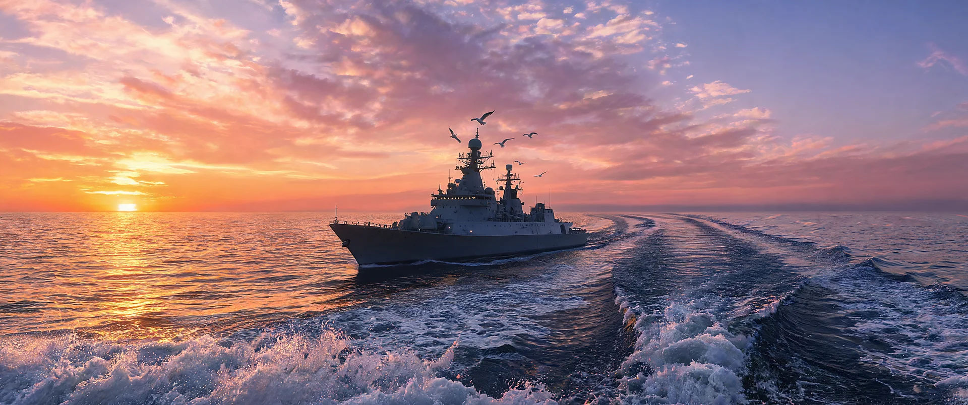 Warship Cutting Through Golden Sunset
