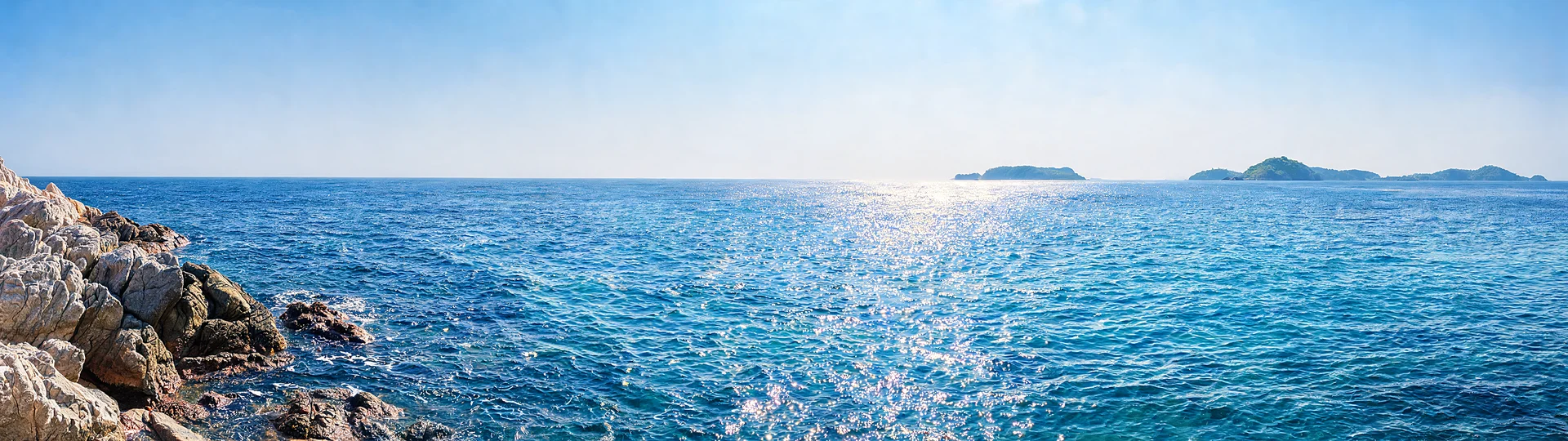 Golden Light Across the Azure Sea