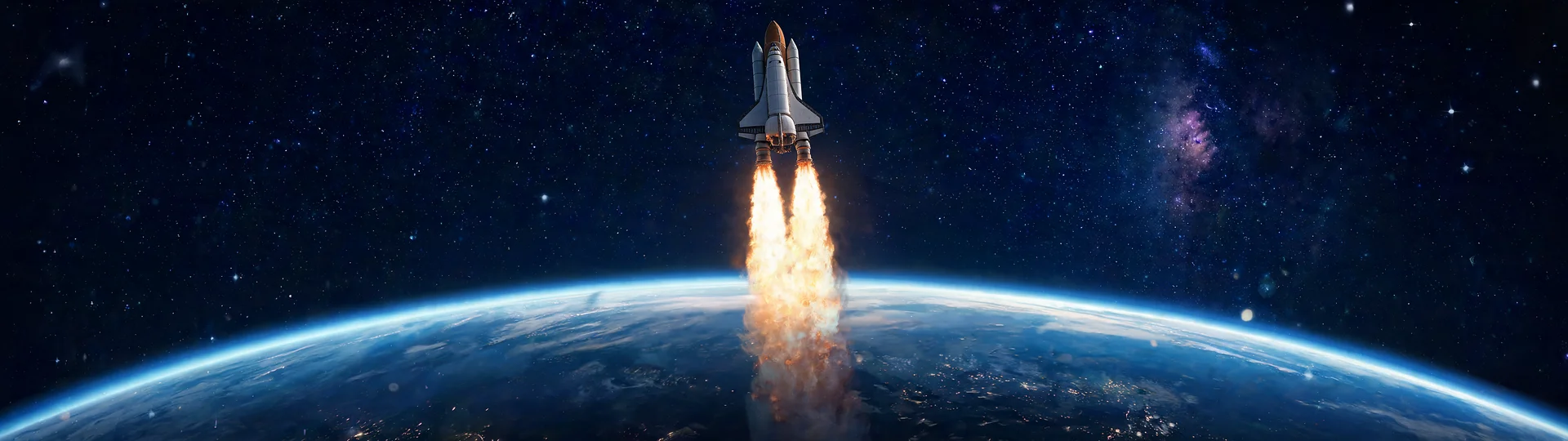 Space Shuttle Ignition Above Earth